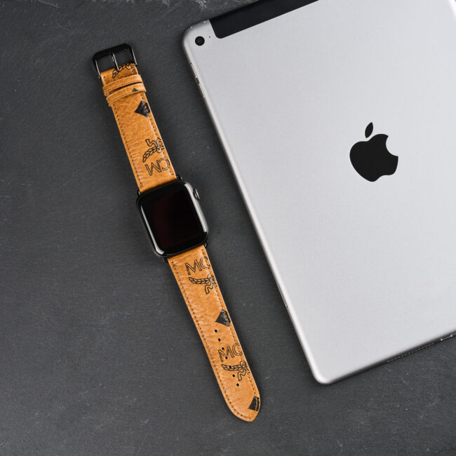 a watch next to a tablet
